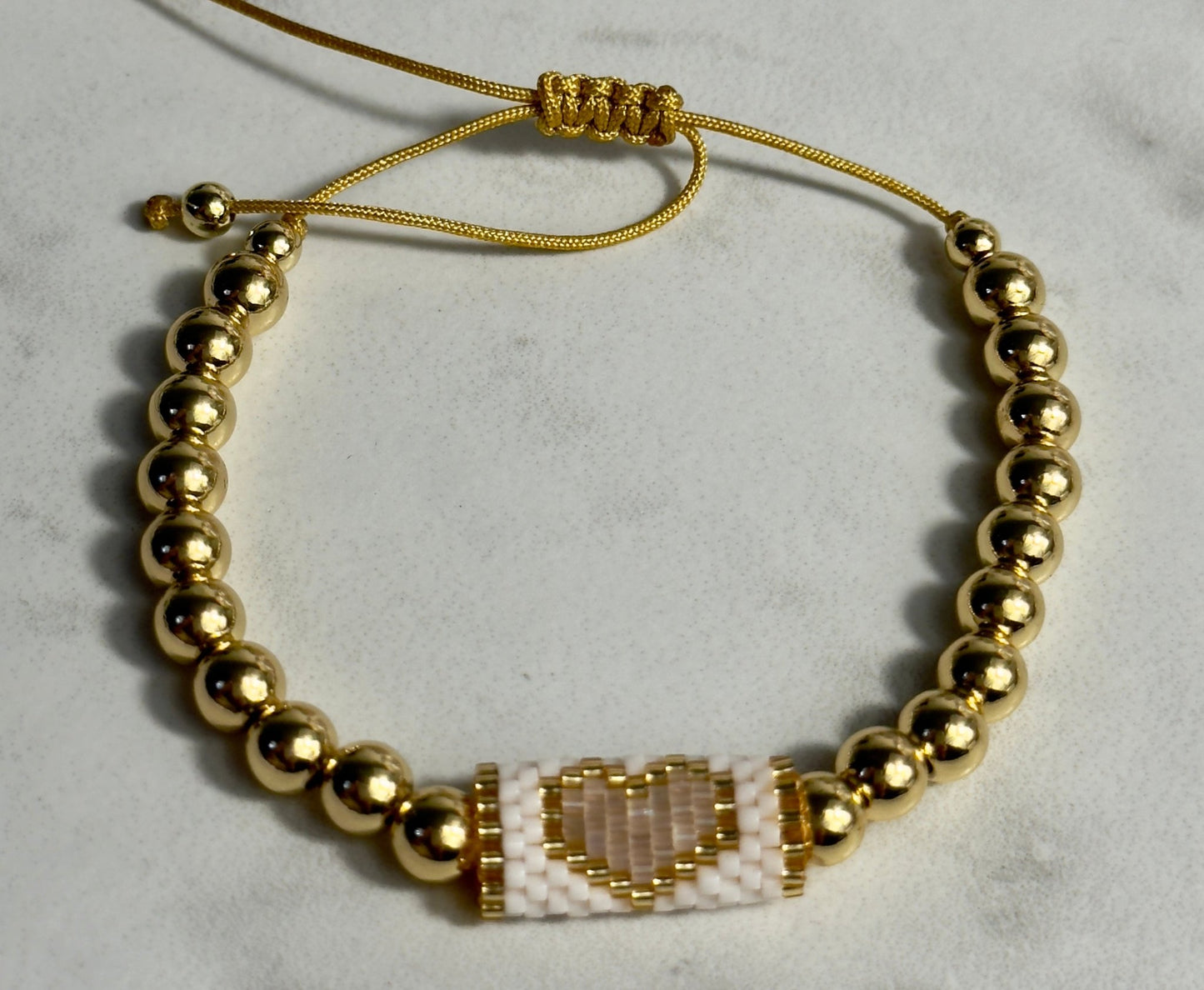 Gold beads heart tub - Figi JewelsBeads bracelet