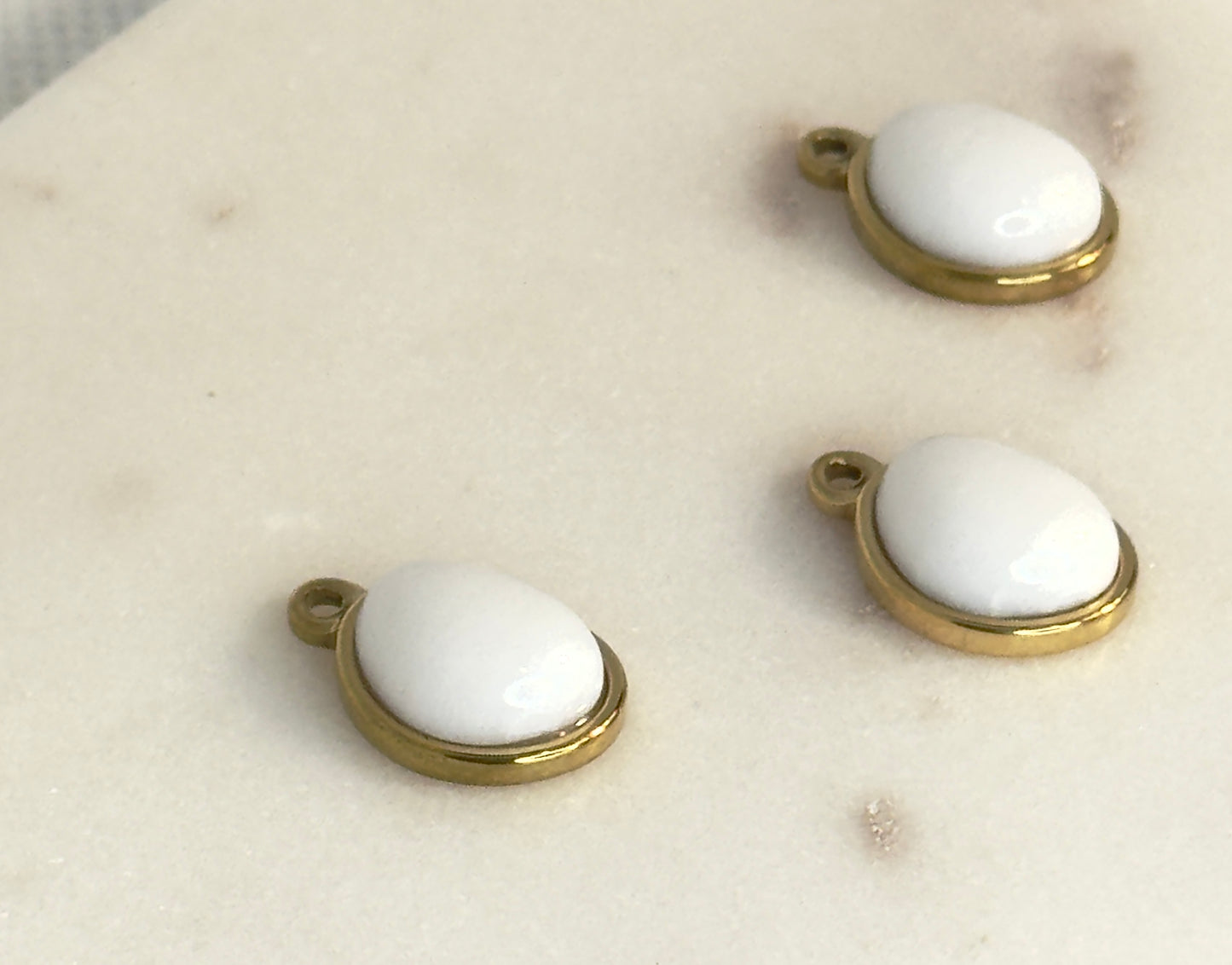 White Oval Stainless Steel Charm