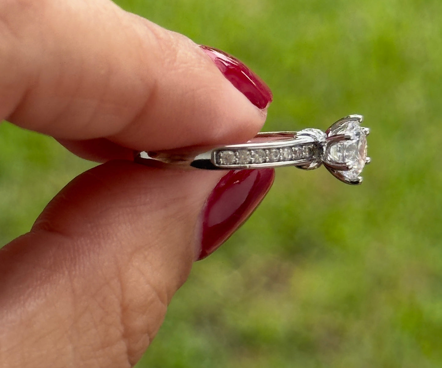 Classic Solitaire Ring With a Pave Band