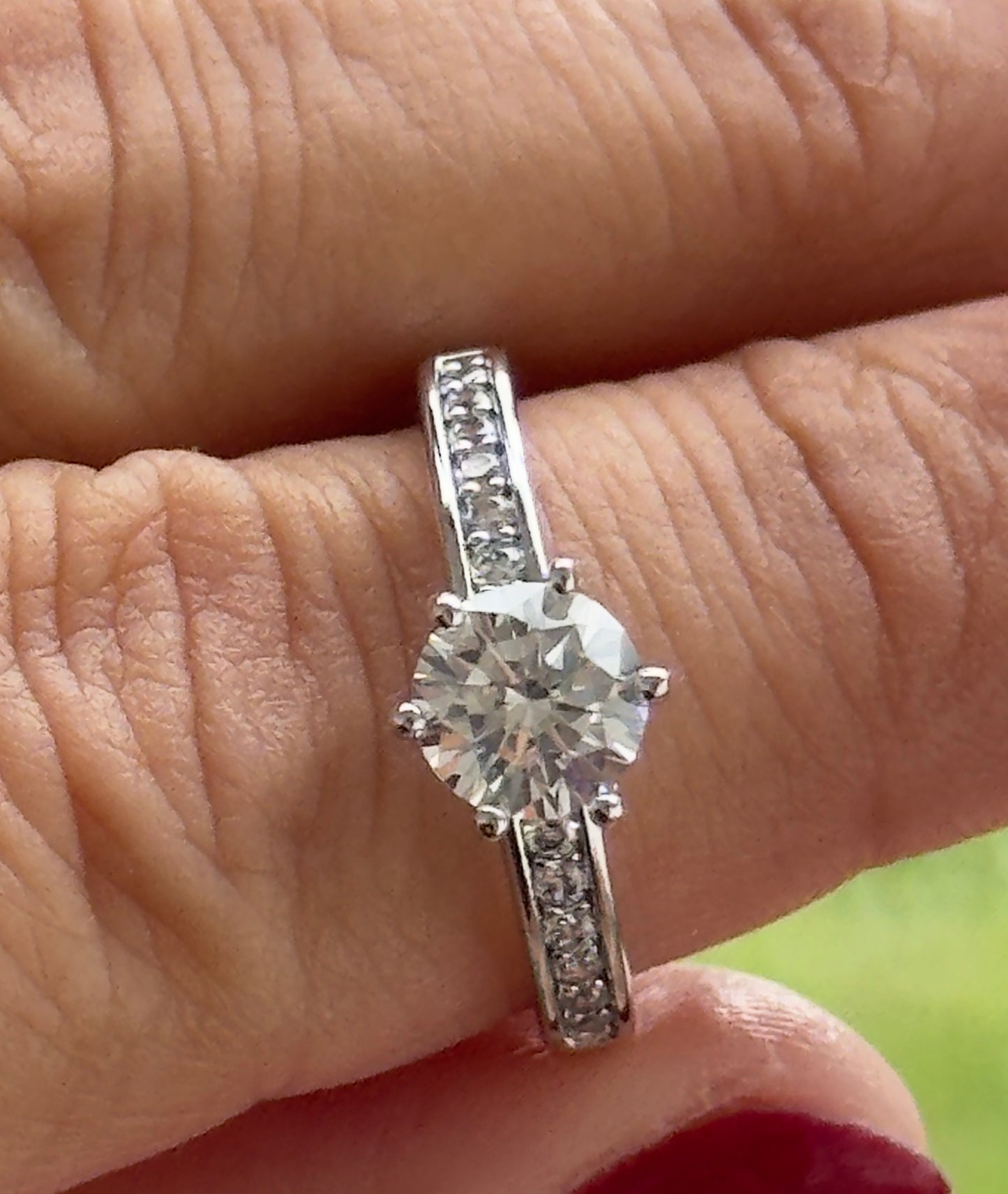 Classic Solitaire Ring With a Pave Band