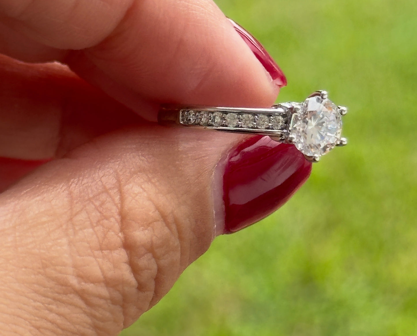 Classic Solitaire Ring With a Pave Band